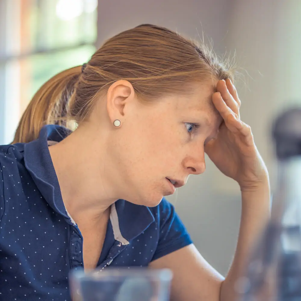 Business owner looking frustrated at a laptop screen